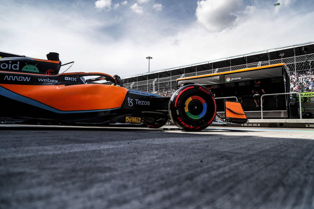 Daniel Ricciardo, McLaren MCL36, leaves the garage side on